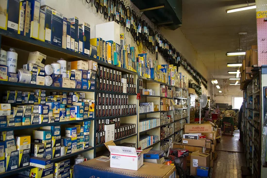 Auto parts export Dubai — wholesale spare parts warehouse with filters, belts, and engine kits