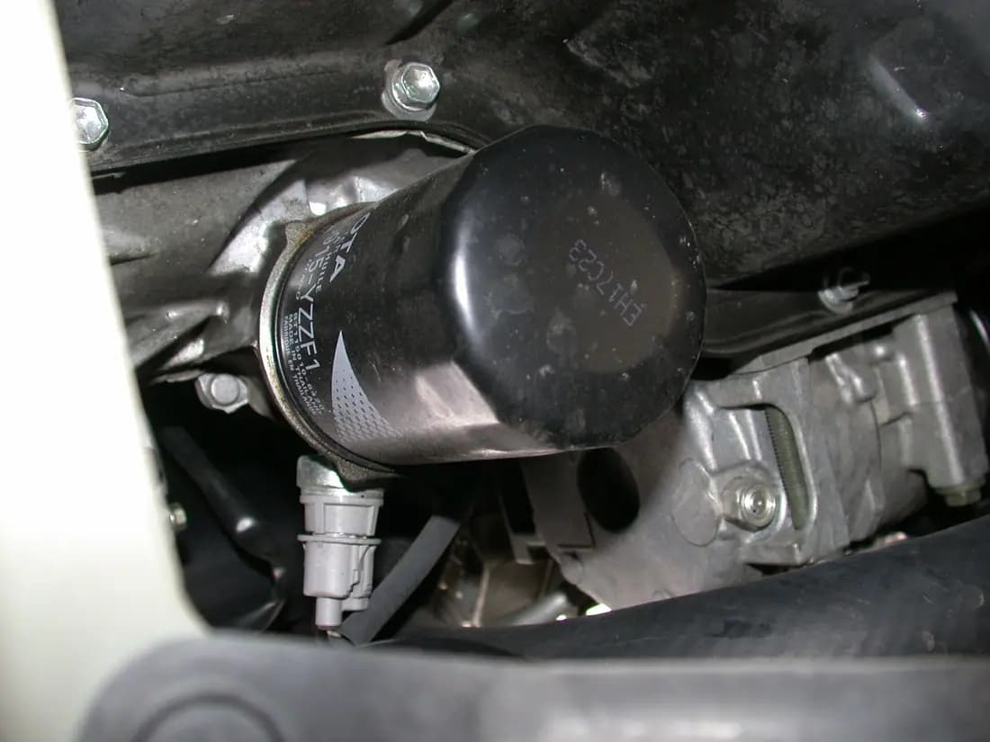 Toyota filters UAE — genuine Toyota oil filter spare part mounted on the engine